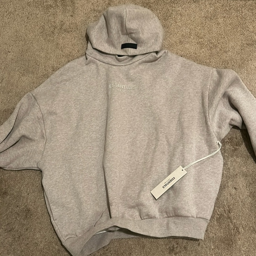 Essentials hoodie. Men’s medium(runs big) tan/ cream colored new and never worn